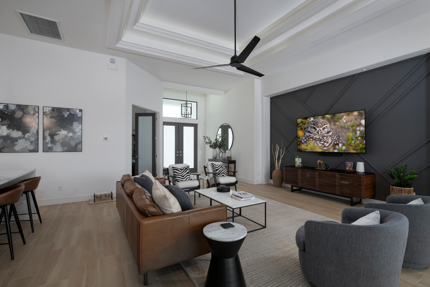 View of great room in open concept home from dining area